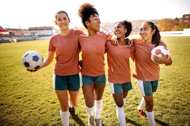 girls playing soccer